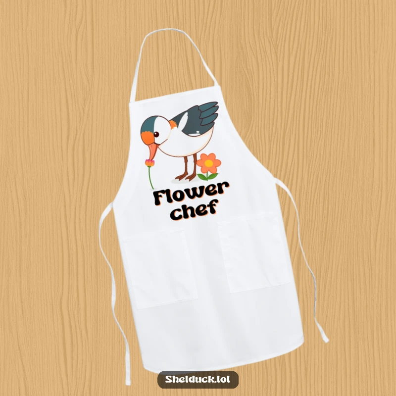 Funny shelduck bird apron, curiously pecking at a brightly colored flower, kitchenware, great funny gift.