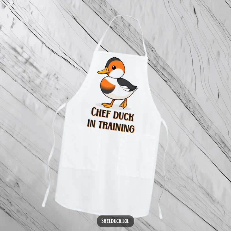 Funny apron featuring a cute shelduck waddling with determination, perfect for the focused chef in the kitchen.