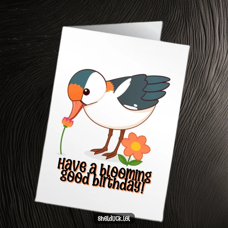 Funny Free Printable Birthday Card featuring a shelduck bird curiously pecking at a brightly colored flower, celebrating a birthday.
