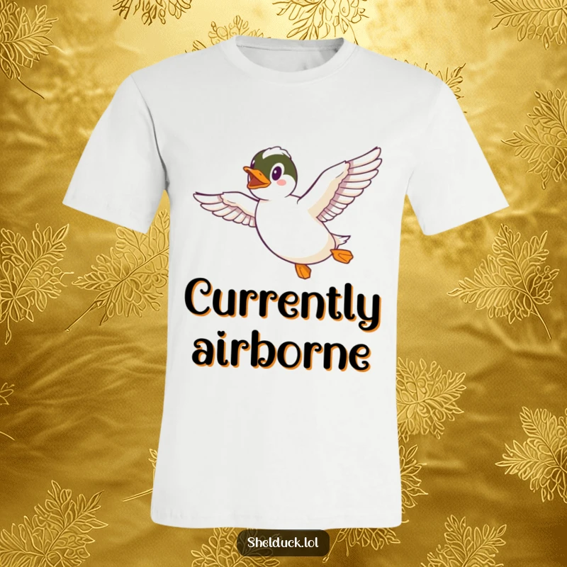 Funny Shelduck T-Shirt depicting a cheerful shelduck soaring through the sky with its wings fully extended, a humorous statement piece.