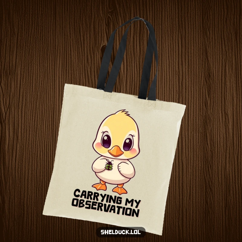 Funny shelduck tote bag featuring a bird with wide, curious eyes intently observing a small bug.