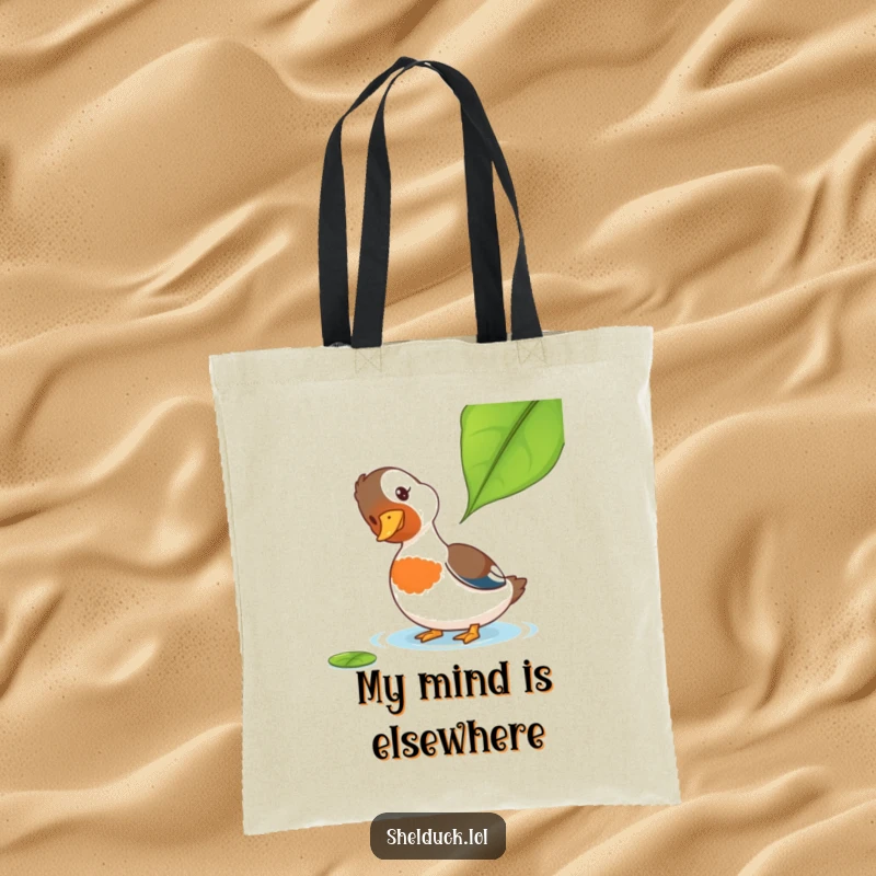 Funny Shelduck Tote Bag: A shelduck with a curious head tilt watches a leaf, making this a funny, practical bag for daily use.